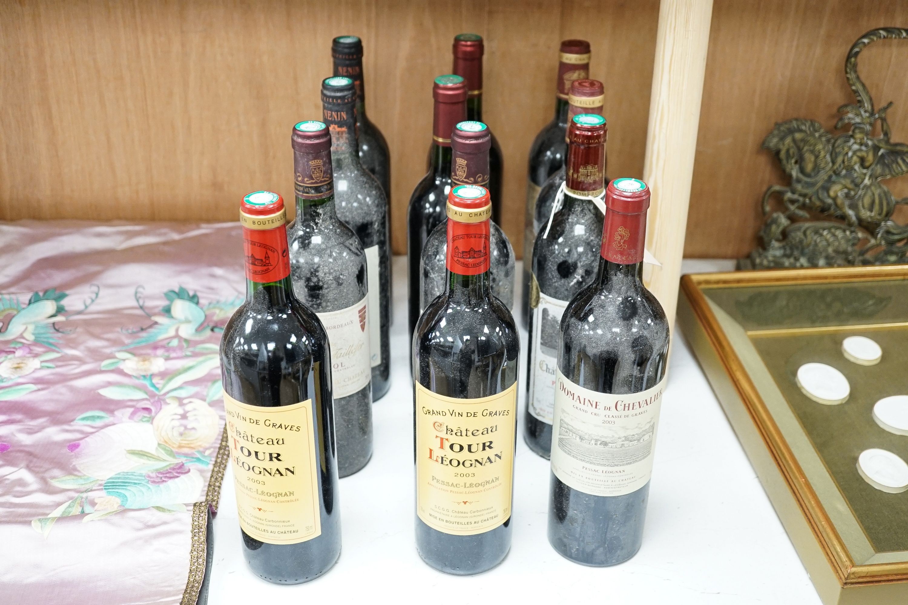 Twelve various bottle of red wine